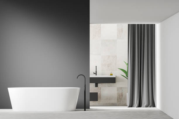 istock Gray and white bathroom with sink and tub 1151592216