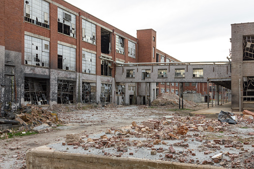 Leftover remnants of an abandoned red brick factory left to rot in the deep south