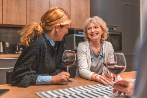 istock Family talking at dining table in the evening 1151597574