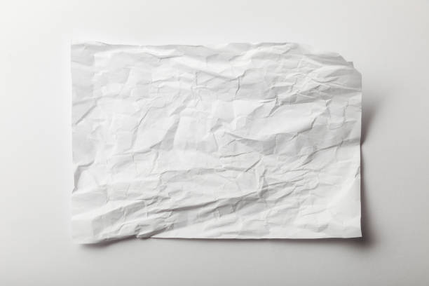 istock top view of blank crumpled page on white background 1151599267