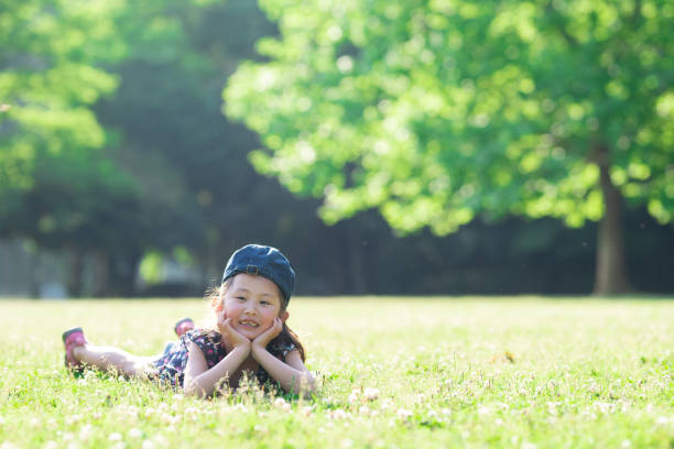 istock Girl lying on the meadow 1151600704