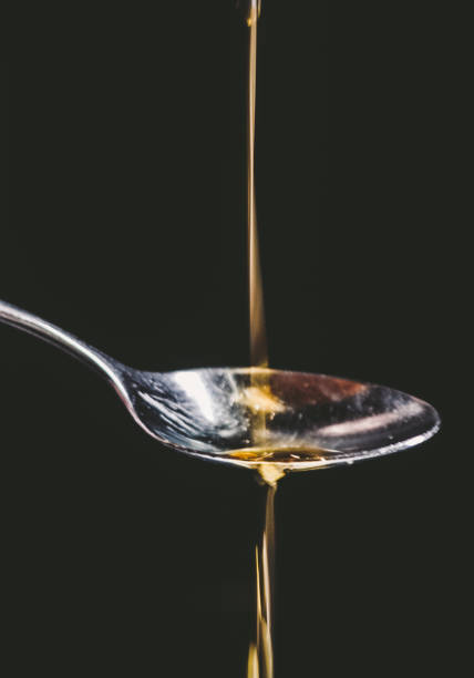 istock Olive Oil on Spoon 1151602758