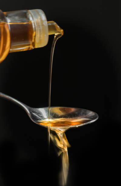 istock Olive Oil on Spoon 1151602761