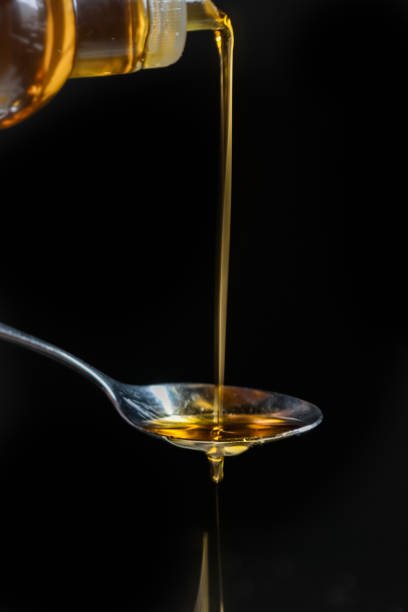 istock Olive Oil on Spoon 1151602774