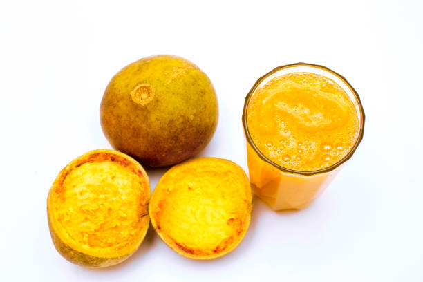 istock image of bael fruit juice with white background 1151602957