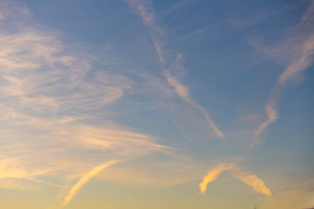 istock pink clouds in the orange sky at sunset 1151604305