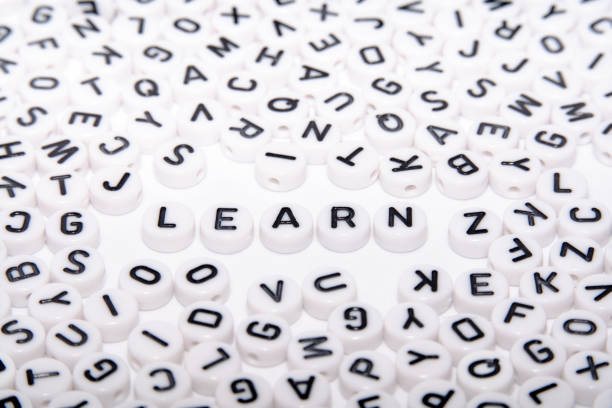 istock Learn word written with buttons/dice with black text written on top far away shot 1151605548