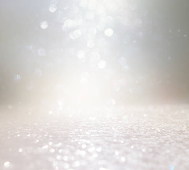 istock abstract glitter silver and gild lights background. de-focused 1151609471