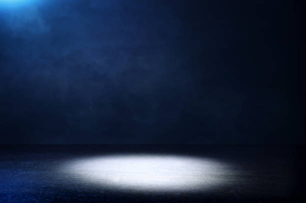 istock abstract dark concentrate floor scene with mist or fog, spotlight and display 1151609653