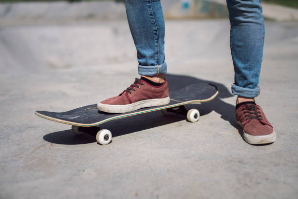 istock Close-up of man riding skateboard. 1151614004