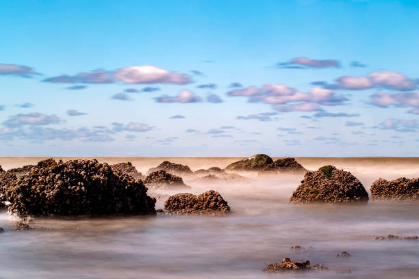 North Sea with cloudy sky in Middelkerke Belgium - long exposure time
