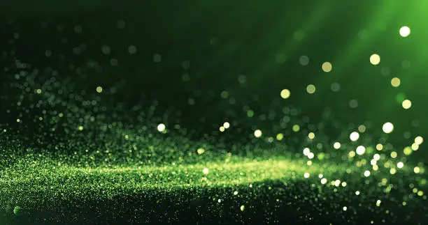 Photo of Defocused Particles Background (Green)