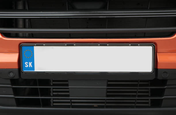 istock Empty License plate in the front of a orange car 1151622797