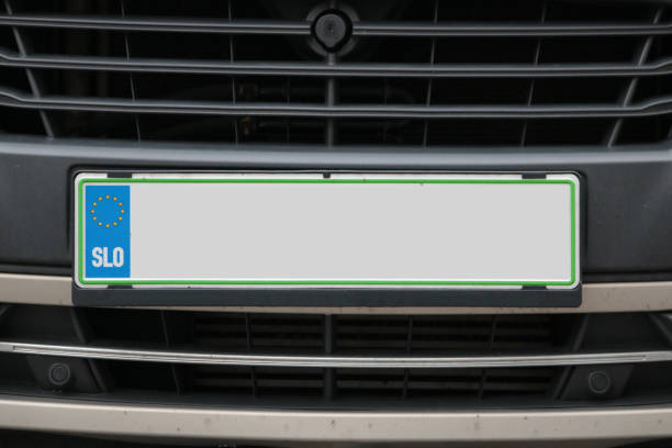 istock Empty License plate in the front of a white car. 1151622804