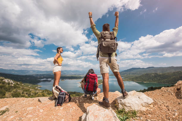 istock Three happy young friends hiking together. 1151630051