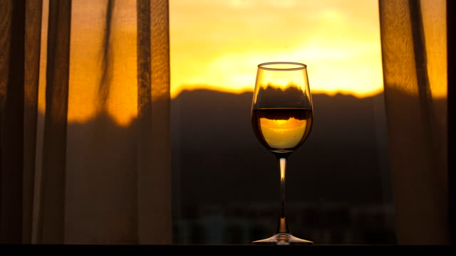 Champagne with window sunset background