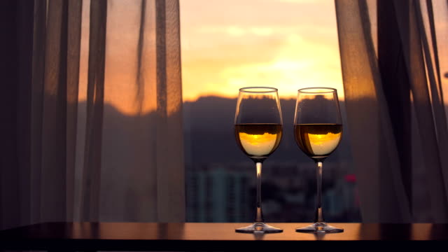 Champagne with window sunset background