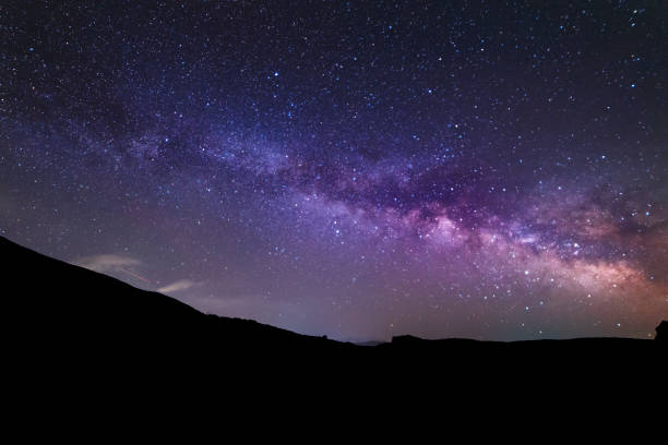 istock Milky way galaxy, beautiful starry night. 1151631542