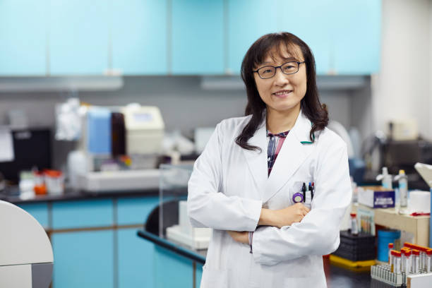 istock Female researcher standing with arms crossed 1151640497