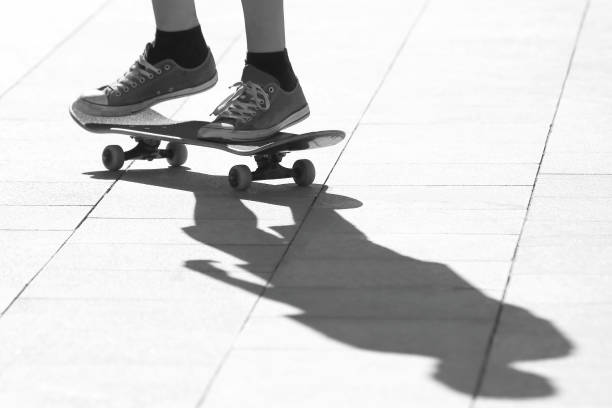 istock young people riding on a skateboard 1151643858