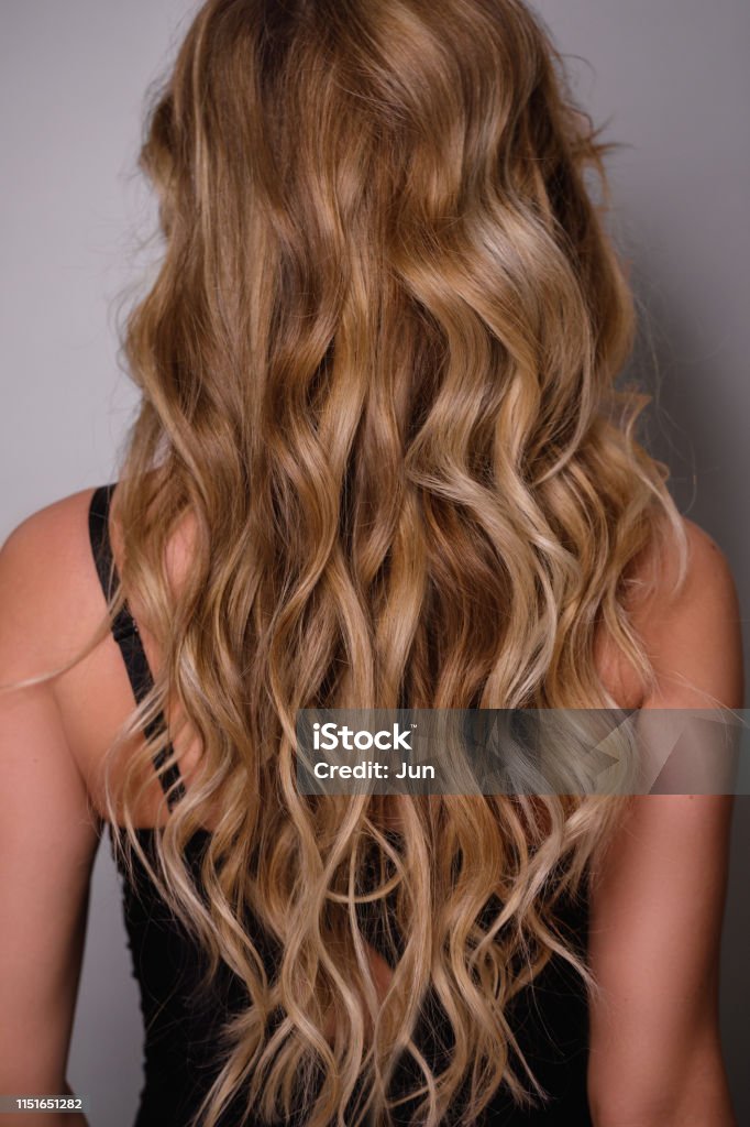 Woman With Beautiful Curly Hair Stock Photo - Download Image Now - Blond  Hair, Ombre Hairstyle, Wavy Hair - iStock
