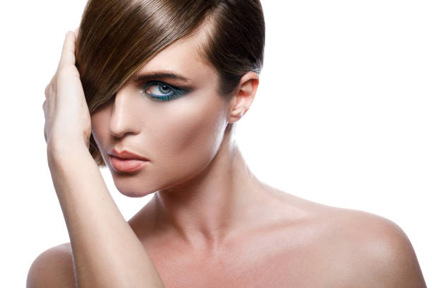 istock Model in stylish image with sleek hair covering one eye 1151651916