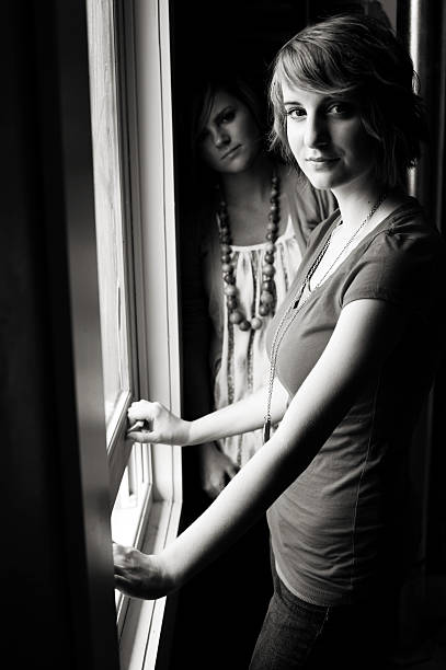istock young female window portraits 115165312