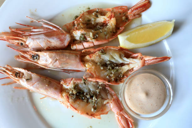 istock King prawns and sauceon white plate 1151654423