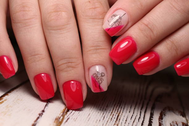 istock Multi-colored pastel manicure combined tone on tone with a striped background.Nail art 1151654980
