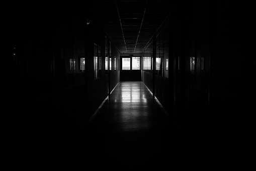 b/w dark hallway perspective