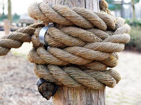 Thick Rope On A Wooden Column Forming A Knot As Part Of The Rope Fence  Stock Photo - Download Image Now - iStock