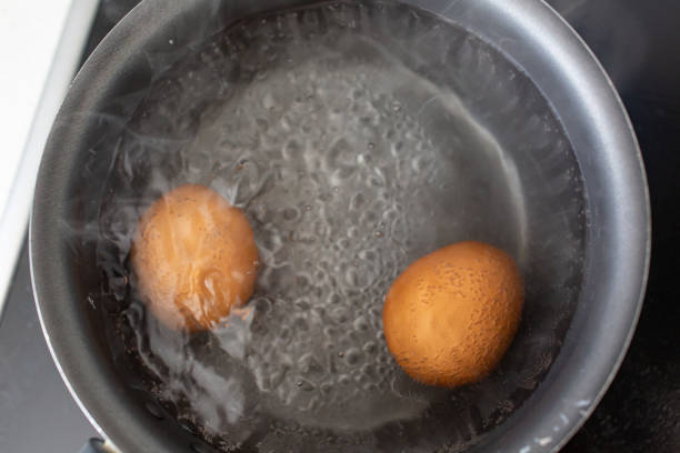istock Eggs are boiled in a saucepan in boiling water. 1151660899