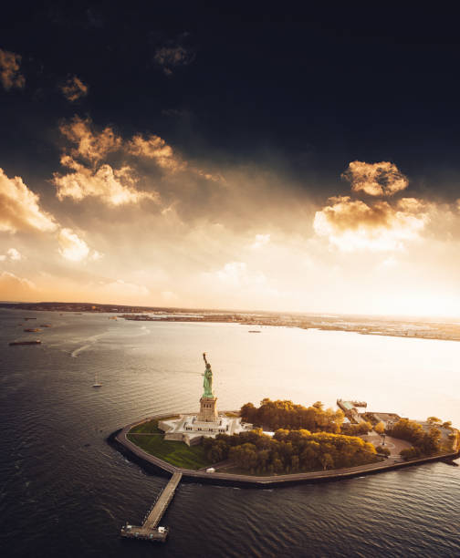 istock flying over the statue of liberty 1151662915