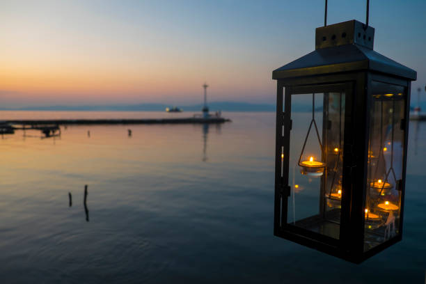 istock Lantern in Sunset at Thassos Harbour, Thassos Island, Greece 1151666651