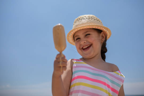 istock Girl having fun with ice cream 1151668782