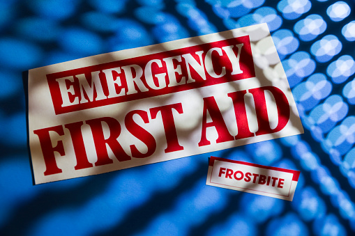 Close-up text Emergency First Aid with illness sympton  - accident.