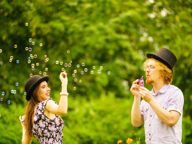 istock Couple blowing bubbles outdoor 1151669845