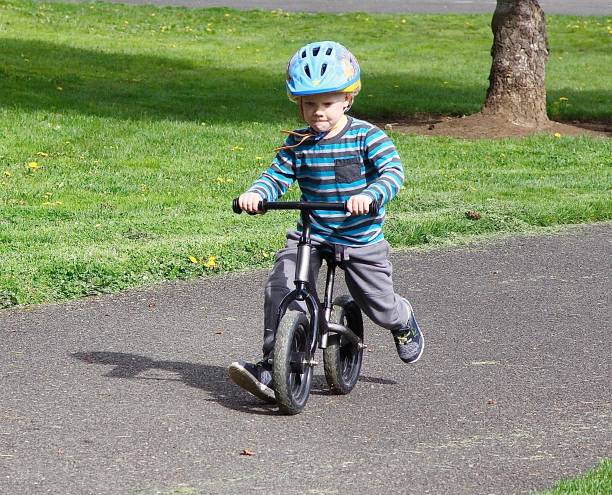istock Five Year Old Riding A Strider Bike 1151672401