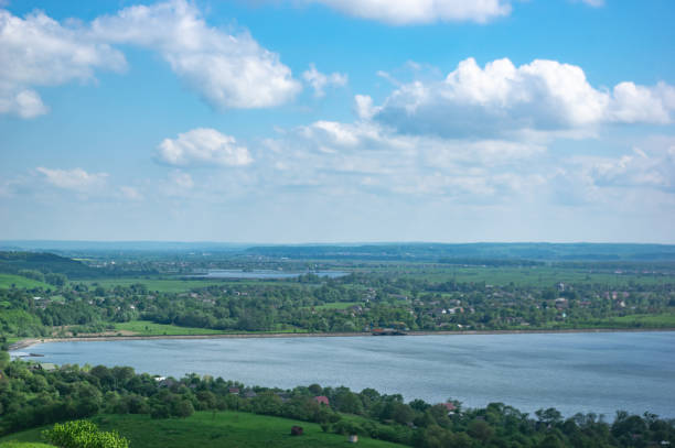 istock Village on the lake in summer 1151673064