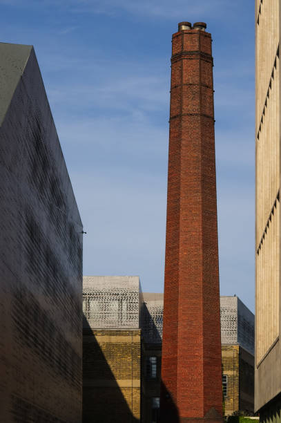 istock Long brown clay brick round chimney 1151675363