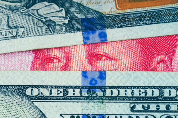 istock 100 US dollar and Chinese Yuan 1151677219