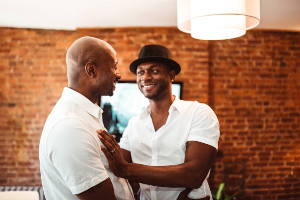 istock gay couple face to face flirting 1151680393