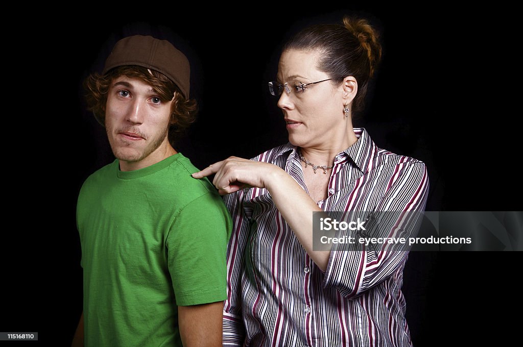 mother young adult son portrait mother and son relationship portraits mom tapping son on sholder Adult Stock Photo