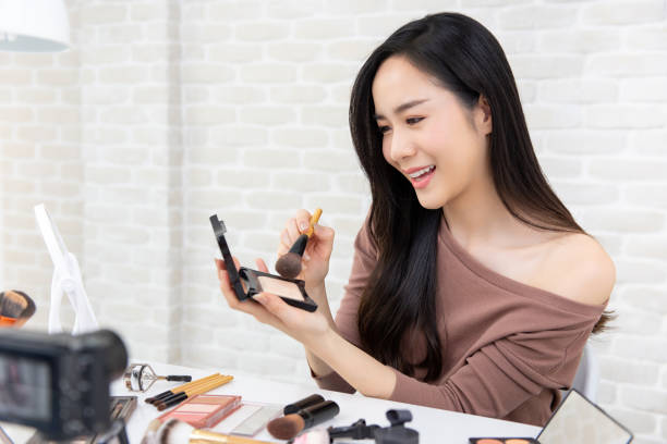 istock Asian woman beauty vlogger  recording make up tutorial 1151683298