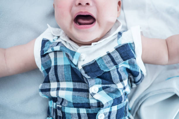 istock Crying Baby, close up shot 1151683316