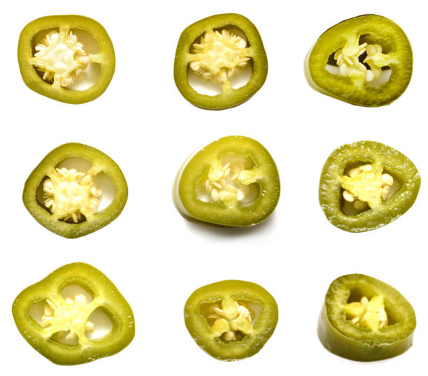 green jalapeno pepper slices isolated white background stock photo