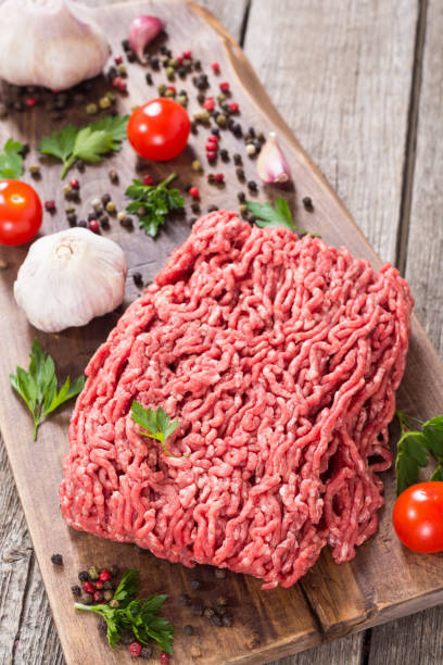 istock Raw minced beef meat with spices and herbs 1151684175