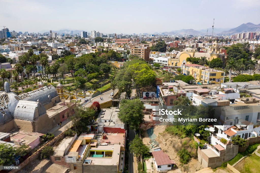 Aerial view of Barranco district and Whisper bridge Aerial view of Barranco district and Whisper bridge. "Puente de los Suspiros" is a touristic place for visit surrounded by colonial buildings and restaurants in Lima, Peru. Lima - Peru Stock Photo
