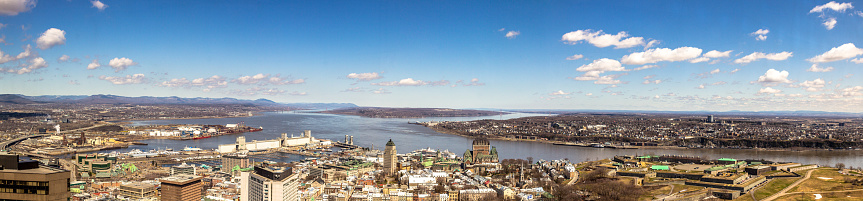 Panoramic view of Old Quebec city from the air. Plaines d'Abraham, Chateau Frontenac, St-Lawrence river, Levis and Ile d'Orleans