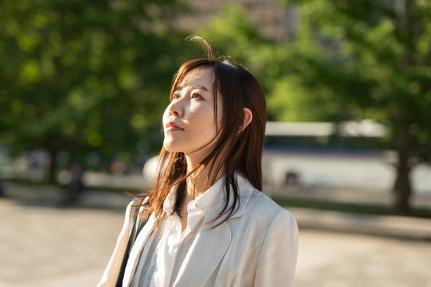 istock Businesswoman looking up at sky 1151706405